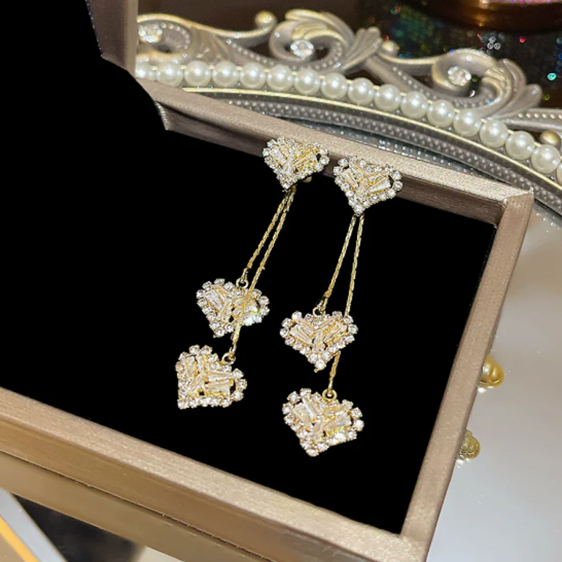 Lumelle™ – Cascading Crystal Heart Drop Earrings + 50% OFF